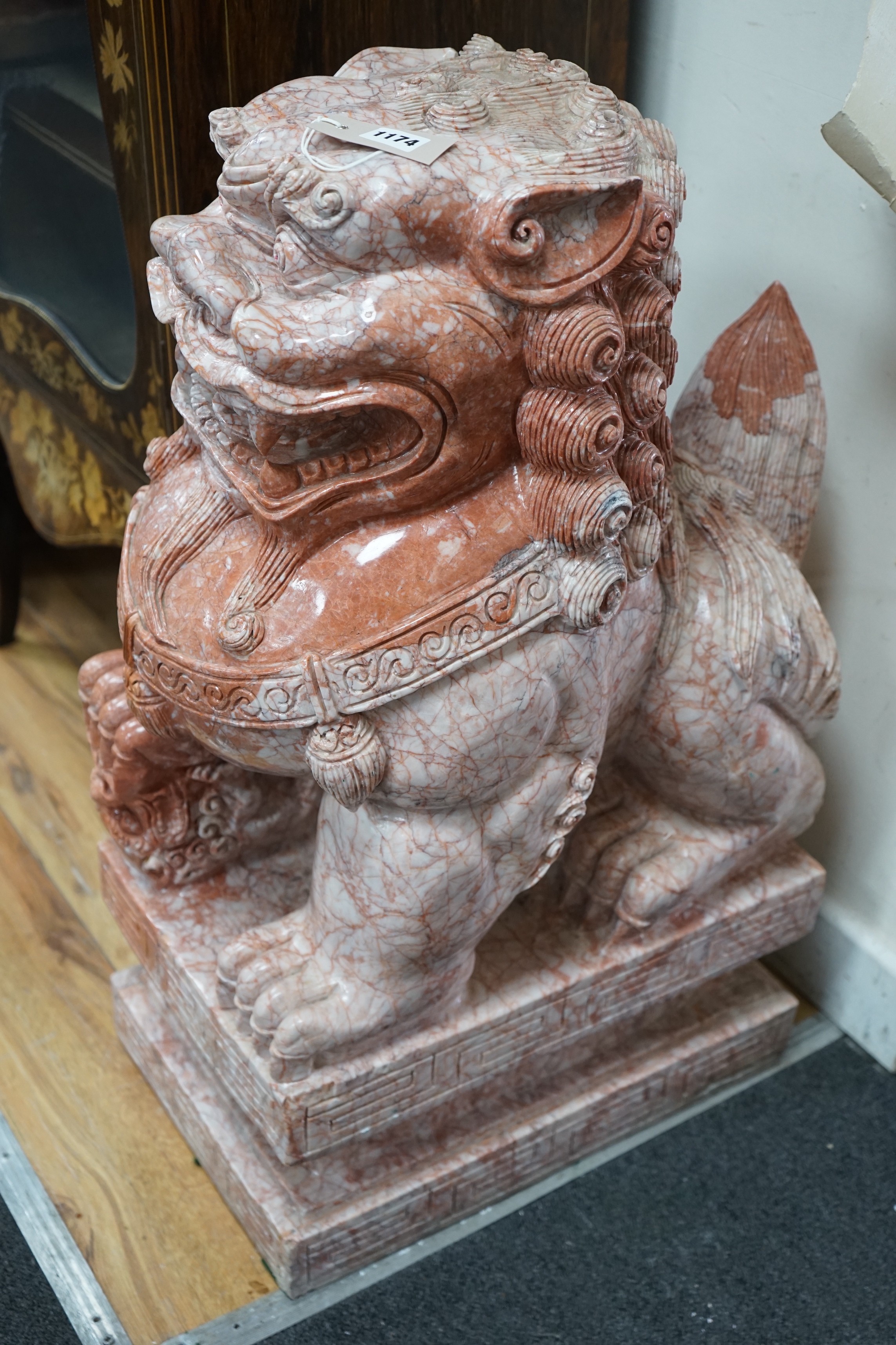 A Chinese carved marble dog of Fo, width 29cm, depth 45cm, height 78cm